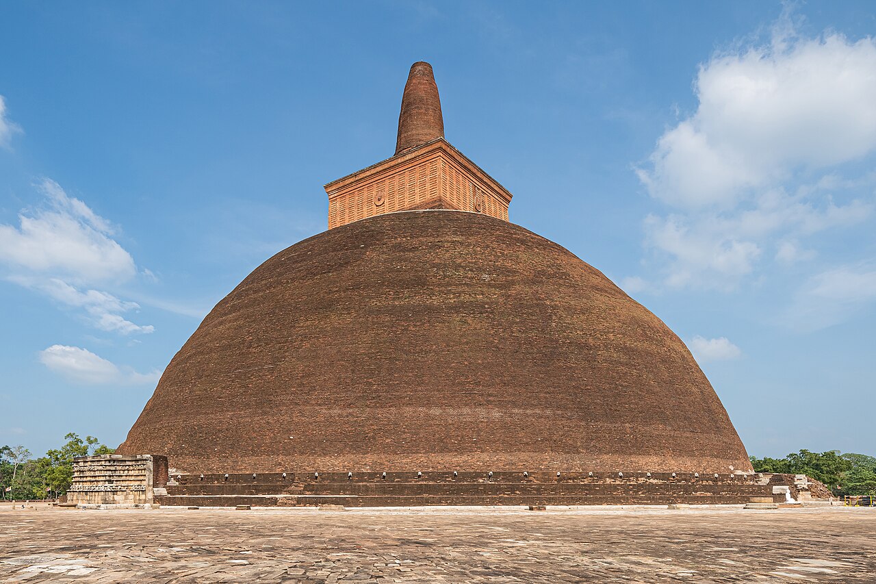 Real photo of Abhayagiri Stupa rising above the monastic ruins